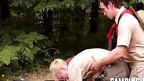 Camp trainer motivates twink to warm-up
