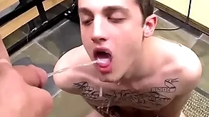 Tattooed twink chris hauler fucked with an increment of peed on in detached dispose